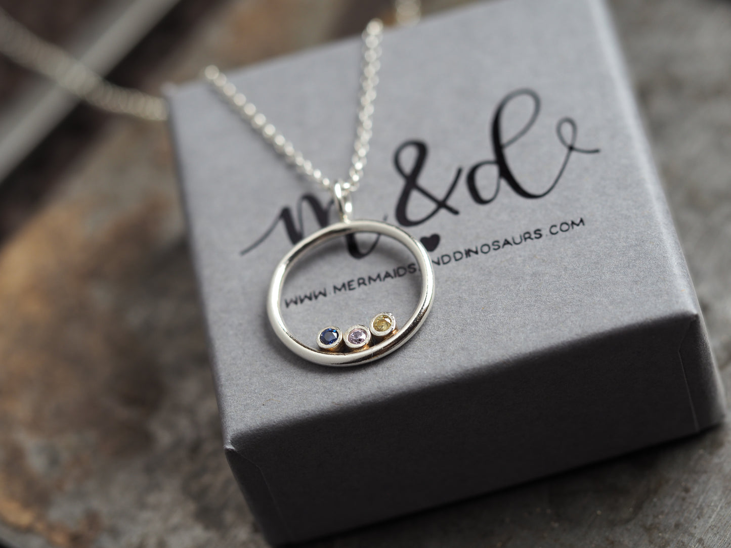 Sterling silver birthstone halo necklace