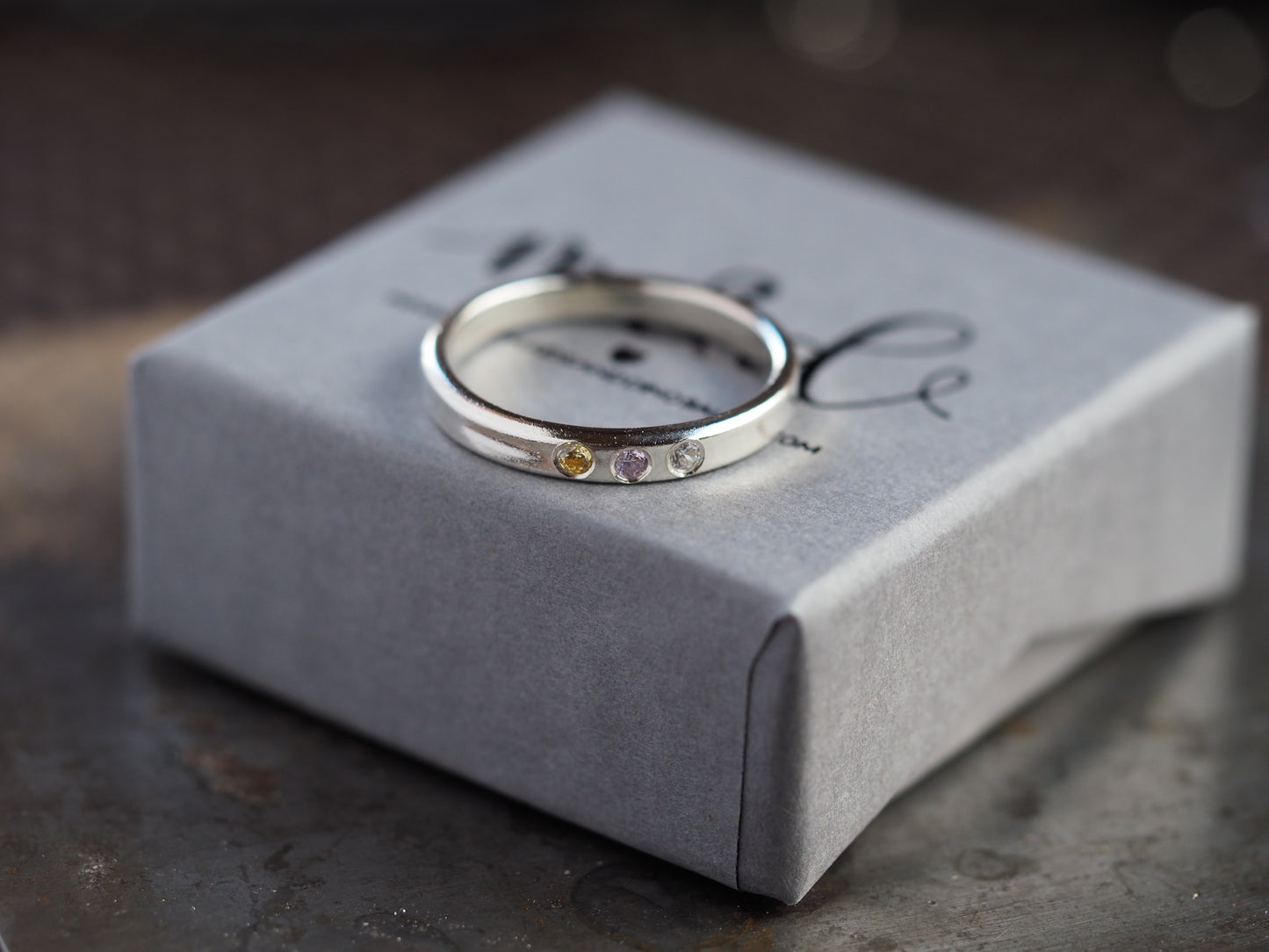 Silver flush set birthstone ring