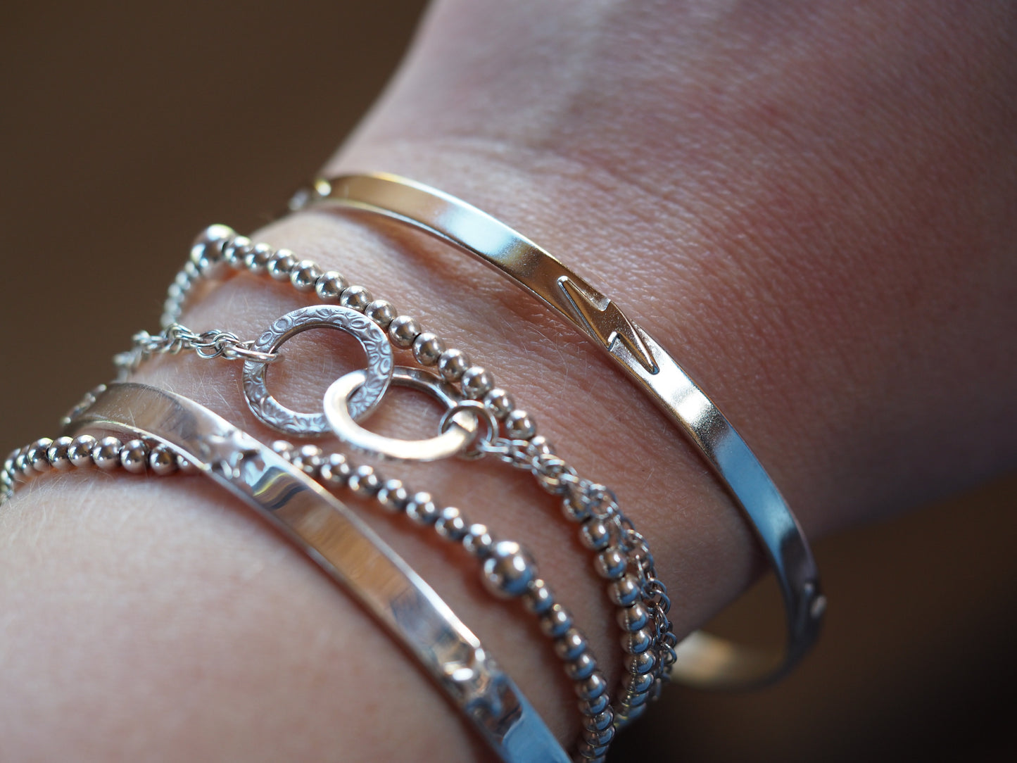 Bracelet entrelacé mini rondelle en argent sterling
