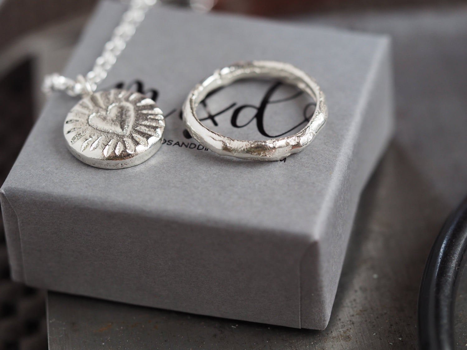 silver heart blast necklace and molten ring