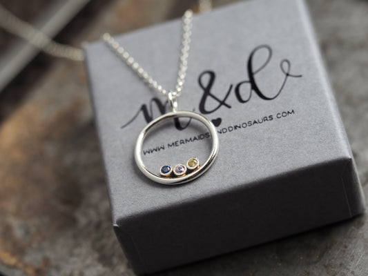 Sterling silver birthstone halo necklace