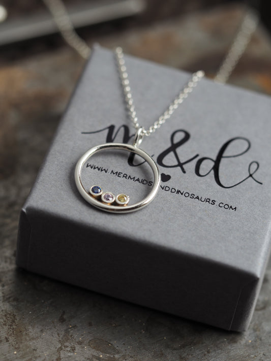 Sterling silver birthstone halo necklace