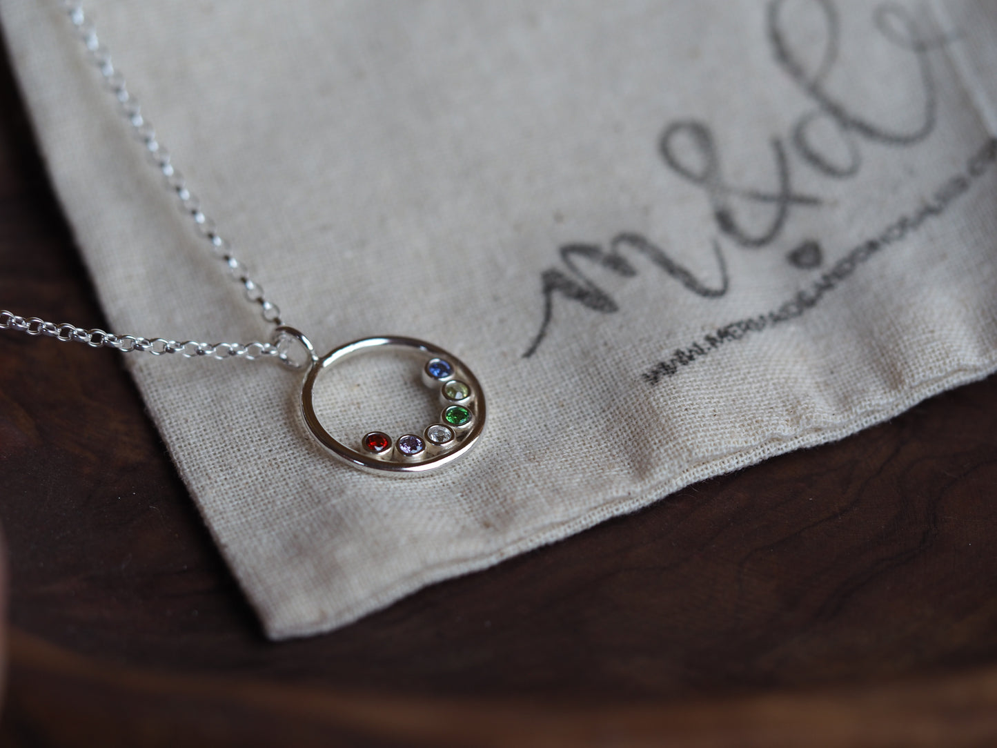 Sterling silver birthstone halo necklace