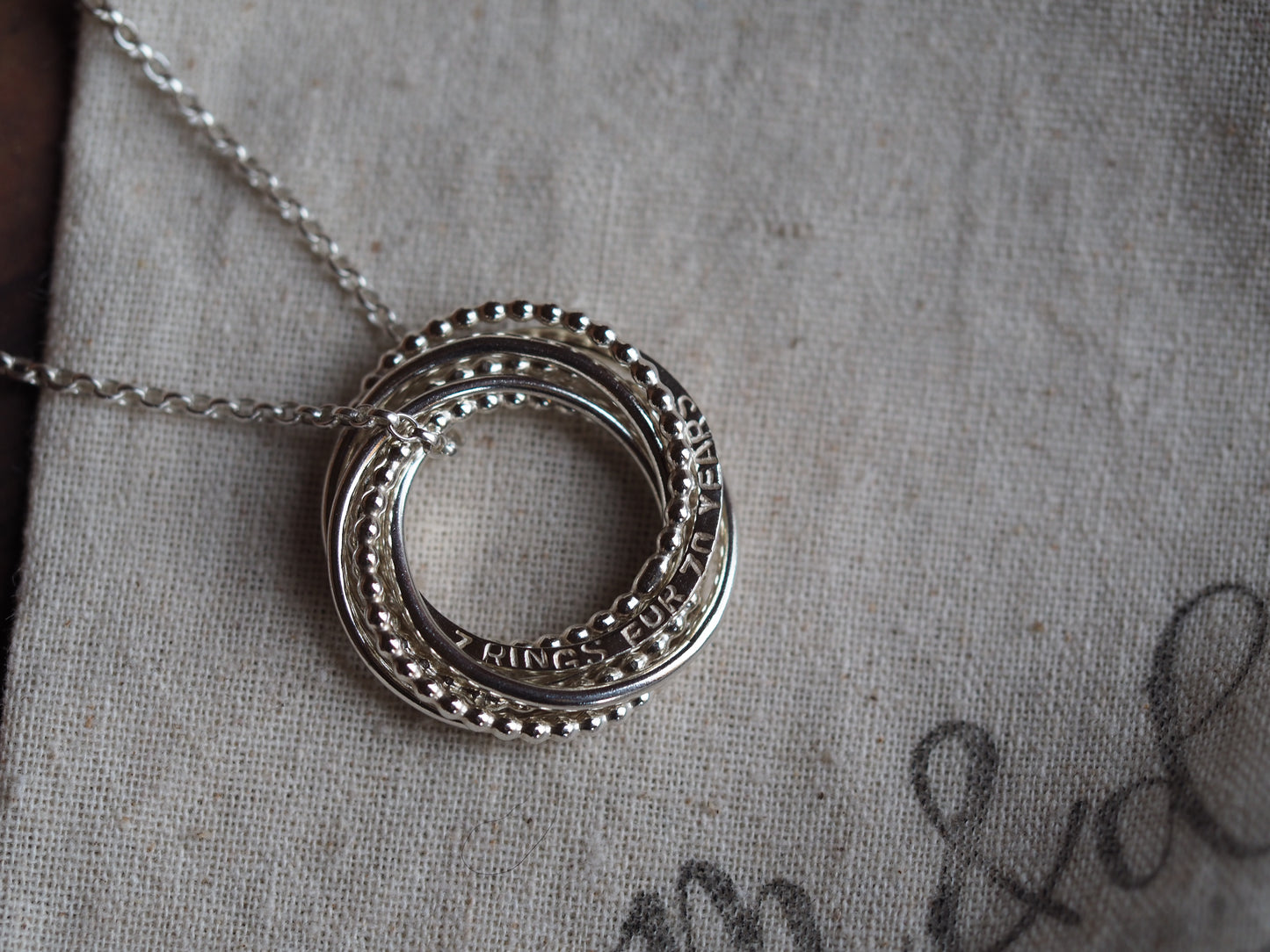 Silver Interlocking ring necklace